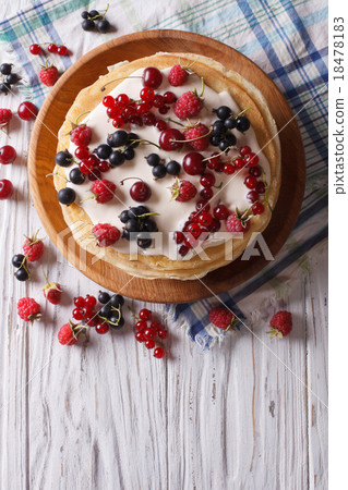 Crepes with berries and cream. vertical top view 18478183
