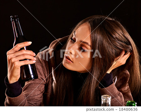 Drunk girl holding bottle of vodka. Drunk girl holding bottle of vodka. 18480636