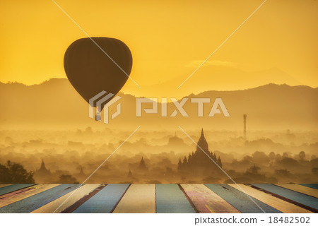 Balloons over Buddhist temples at sunrise in Bagan Balloons over Buddhist temples at sunrise in Bagan 18482502