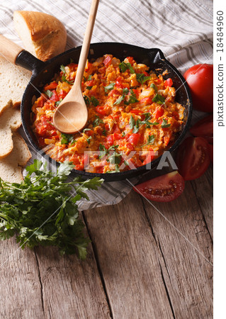 Turkish Menemen fried with vegetables close-up Turkish Menemen fried with vegetables close-up 18484960