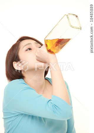 A woman who drinks a trumpet A woman who drinks a trumpet 18485889