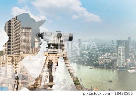 Double exposure of surveyor working with theodolite against bang 18488596