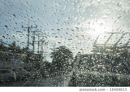 Abstract bokeh from raindrops on glass after rain 18489013