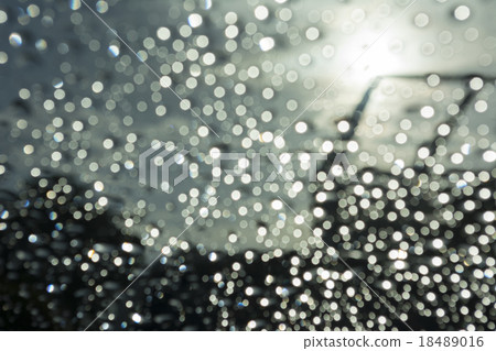 Abstract bokeh from raindrops on glass after rain 18489016