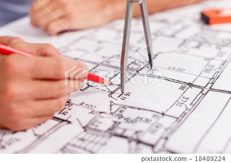 Cheerful two male engineers in the process of work 18489224