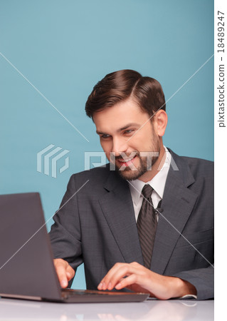 Attractive male reporter is preparing for his 18489247