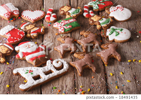 Christmas gingerbread cookies on a wooden table Christmas gingerbread cookies on a wooden table 18491435