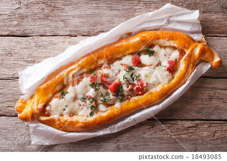 Hot Turkish pide pizza closeup on a table top view 18493085