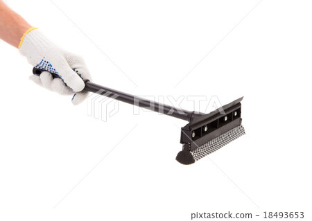 Hand in gloves with rubber window cleaner. Hand in gloves with rubber window cleaner. 18493653