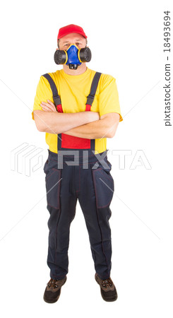 Worker in hat with respirator. Worker in hat with respirator. 18493694