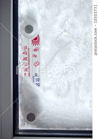 Outer thermometer on a frozen window 18503731