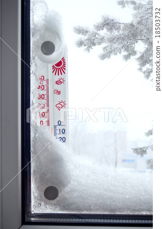 Outer thermometer on a frozen window 18503732