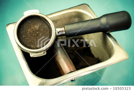 Portafilter with ground coffee Portafilter with ground coffee 18505323