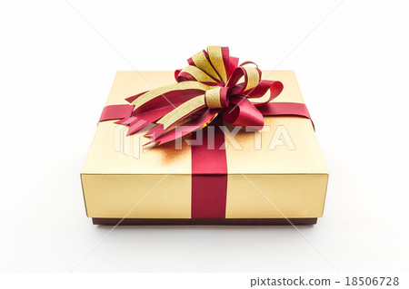 Gold and brown gift box with ribbon bow. 18506728