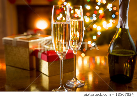 champagne glasses on background of Christmas light champagne glasses on background of Christmas light 18507824
