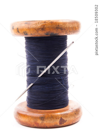 spool of thread with needle  18509302