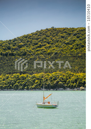 Small sail boat on lake Abrau 18510410