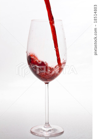 Red wine pouring 18514803