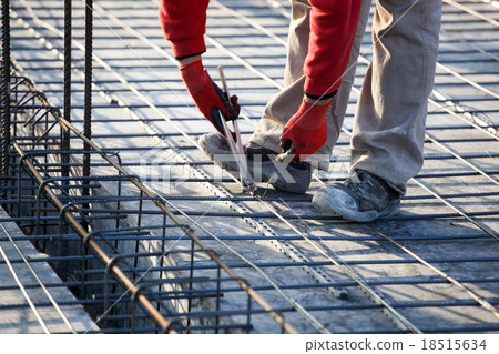 workers make reinforcement for concrete foundation 18515634