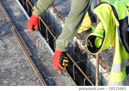 workers make reinforcement for concrete foundation workers make reinforcement for concrete foundation 18515663
