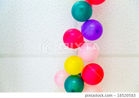 Colorful balloons on ceiling 18520583