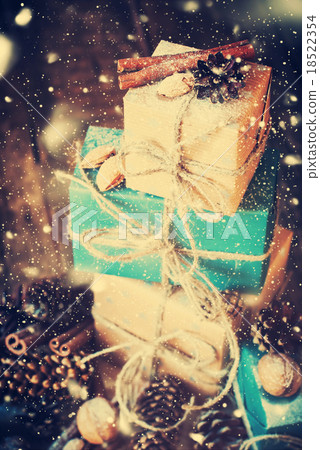 Stack of Holiday Boxes with Cord, Nuts. Drawn Snow 18522354