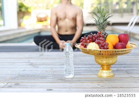 Man in a yoga position 18523555