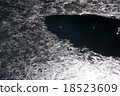 Shining frozen lake surface Shining frozen lake surface 18523609