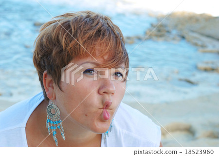woman making fish-face woman making fish-face 18523960