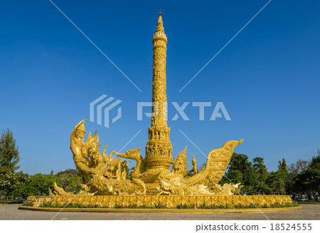 Golden replica of a candle sculpture 18524555