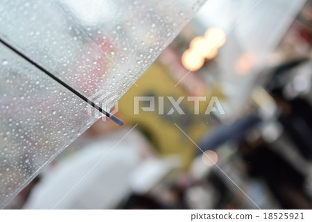 Blur abstract under the umbrella in a rainy day 18525921