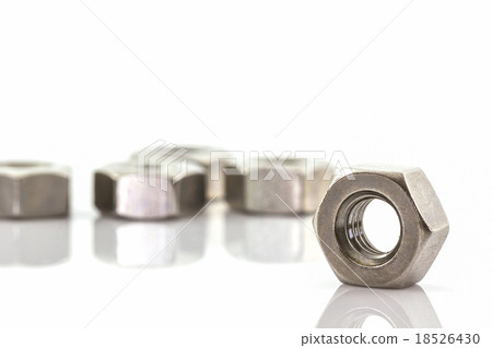 Metal nuts on white background. Metal nuts on white background. 18526430