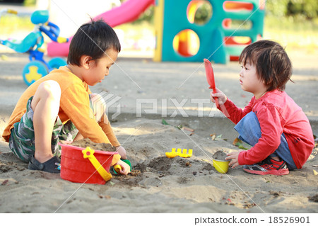 Children playing sandbag with friends 18526901
