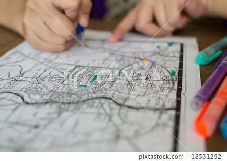 Hand marking on the tourist guide map Hand marking on the tourist guide map 18531292