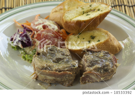 Grilled steak wrapped in bacon Grilled steak wrapped in bacon 18533392