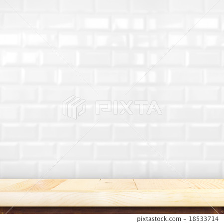 light wood table and white ceramic tile brick wall light wood table and white ceramic tile brick wall 18533714