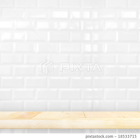 light wood table and white ceramic tile brick wall light wood table and white ceramic tile brick wall 18533715