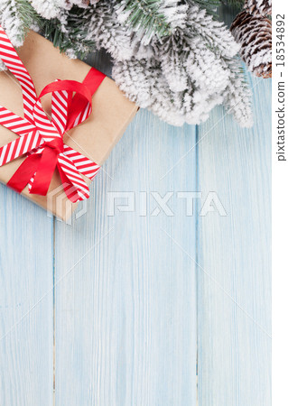 Christmas gift box and tree branch Christmas gift box and tree branch 18534892