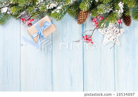 Christmas background with fir tree and gift Christmas background with fir tree and gift 18534897