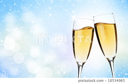 Two champagne glasses over christmas background Two champagne glasses over christmas background 18534965