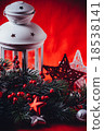 Christmas white lantern is standing with a burning 18538141