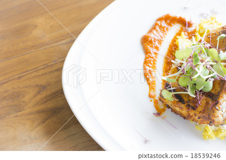 Yellow rice with chicken in modern dish Yellow rice with chicken in modern dish 18539246