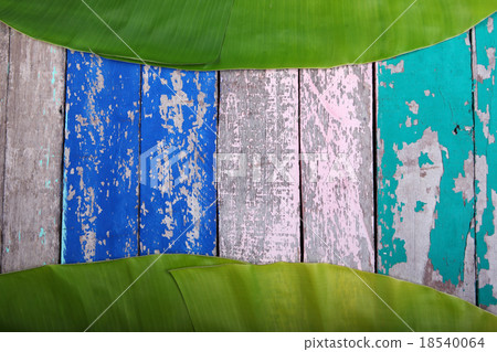banana leaf on grunge wooden panels banana leaf on grunge wooden panels 18540064