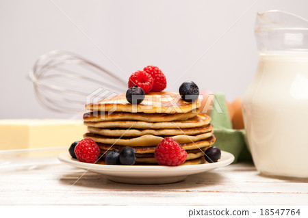High pile of delicious pancakes High pile of delicious pancakes 18547764