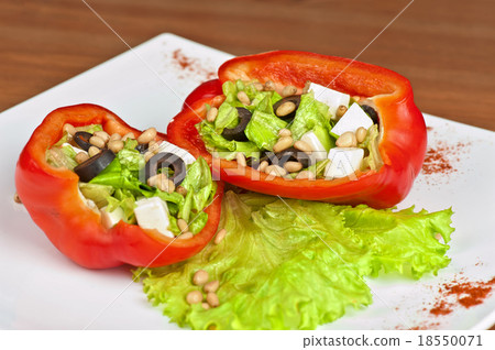 Stuffed peppers roasted with feta cheese Stuffed peppers roasted with feta cheese 18550071