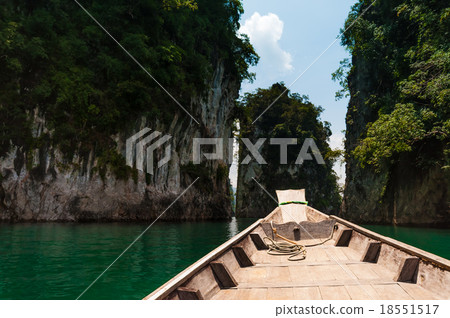 Longtail boat stopped at granite rock, Cheow Lan 18551517