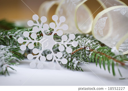 Snowflake out of paper on the background Snowflake out of paper on the background 18552227