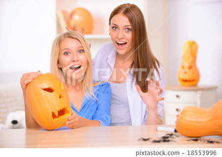 Pretty girls preparing for Halloween party  18553996