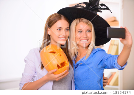 Happy girls making photos Happy girls making photos 18554174