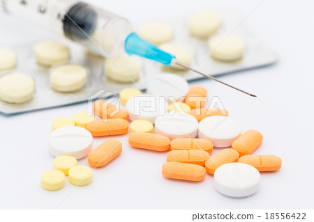 Medicine and syringes 18556422